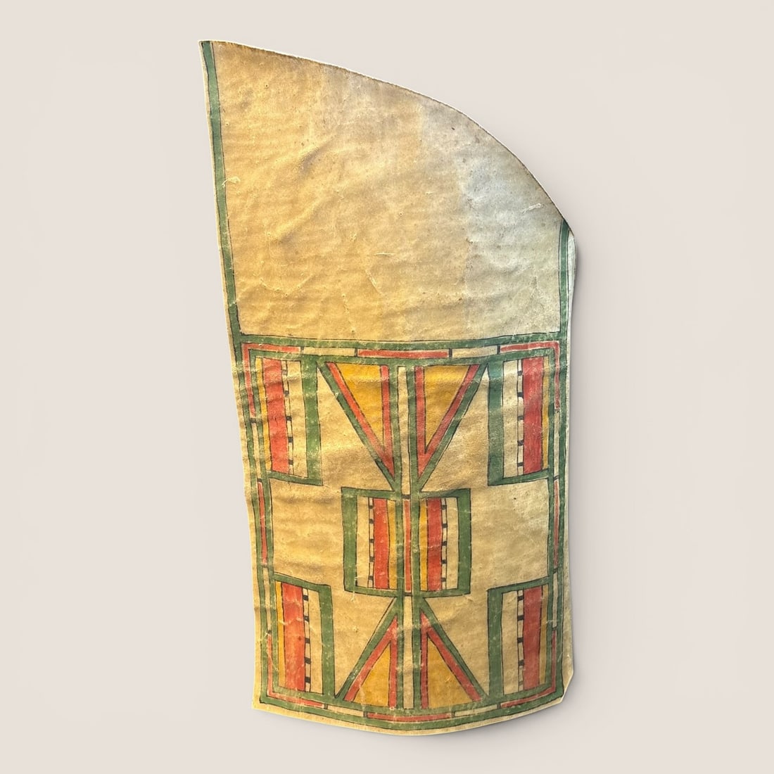 Painted Piece of Parfleche: 20th century, measuring approx 24 x 12 inchesWe provide in-house shipping on all items in the auction. Bid directly at Bid.Ziebarths.com for a lower buyers premium (18%).