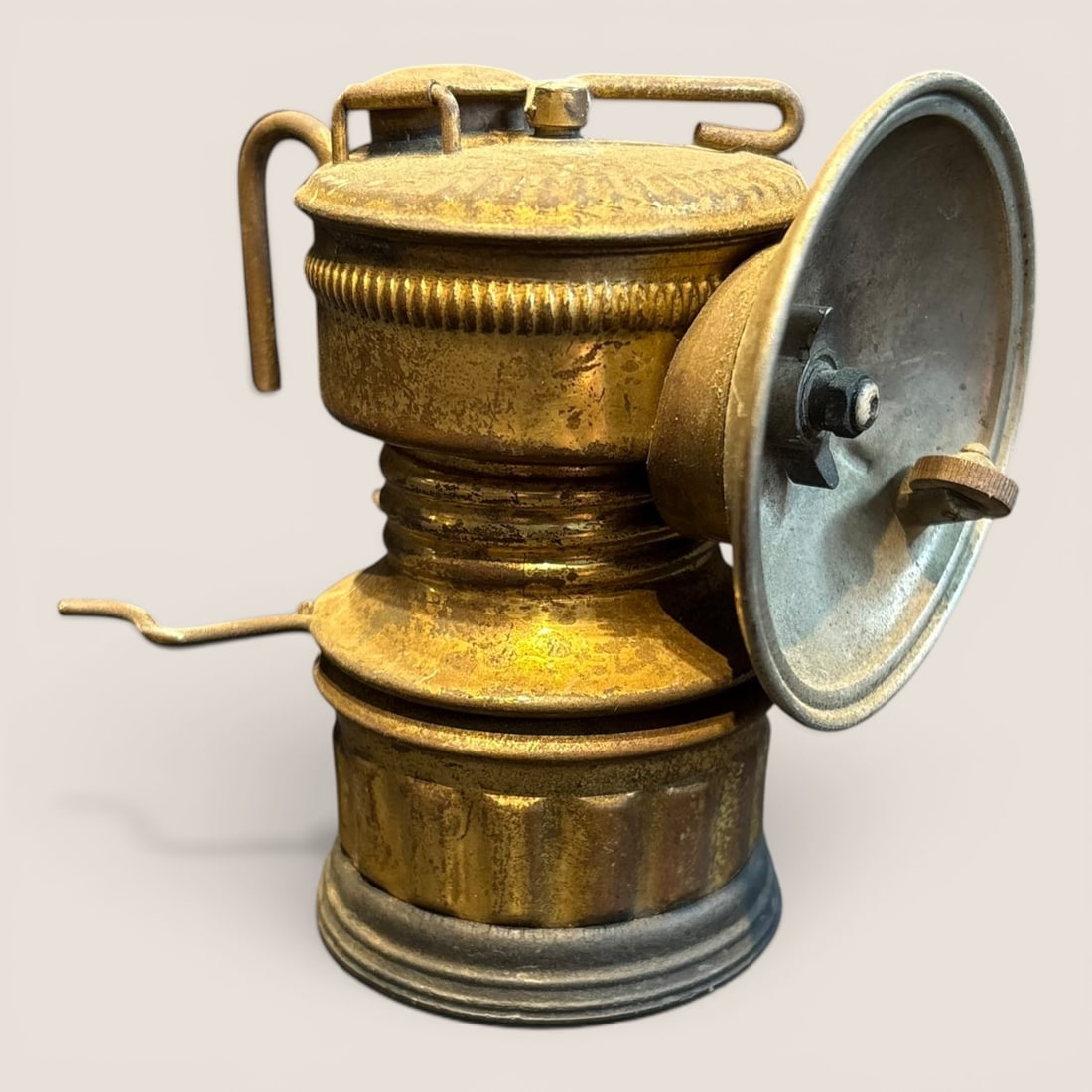 Antique Brass Miners Carbide Lamp: Vintage brass miners carbide lamp, unpolished, 4 inches tallWe provide in-house shipping on all items in the auction. Bid directly at Bid.Ziebarths.com for a lower buyers premium (18%).
