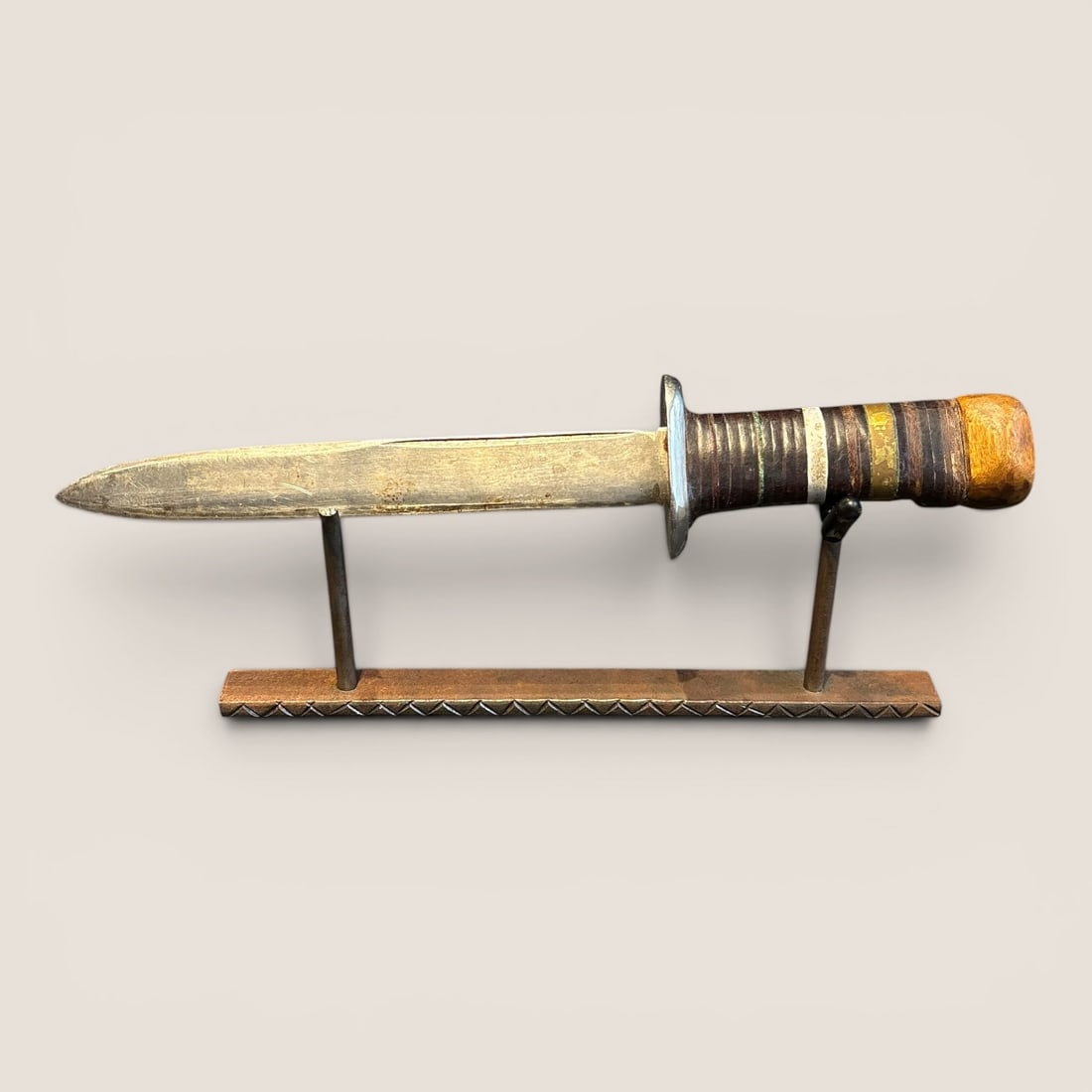 Antique Spear Point Bowie Knife: An 11 inch antique spear point bowie knife, brass guard and end cap, rings with brass spacers for handle, excellent conditionWe provide in-house shipping on all items in the auction. Bid directly at B