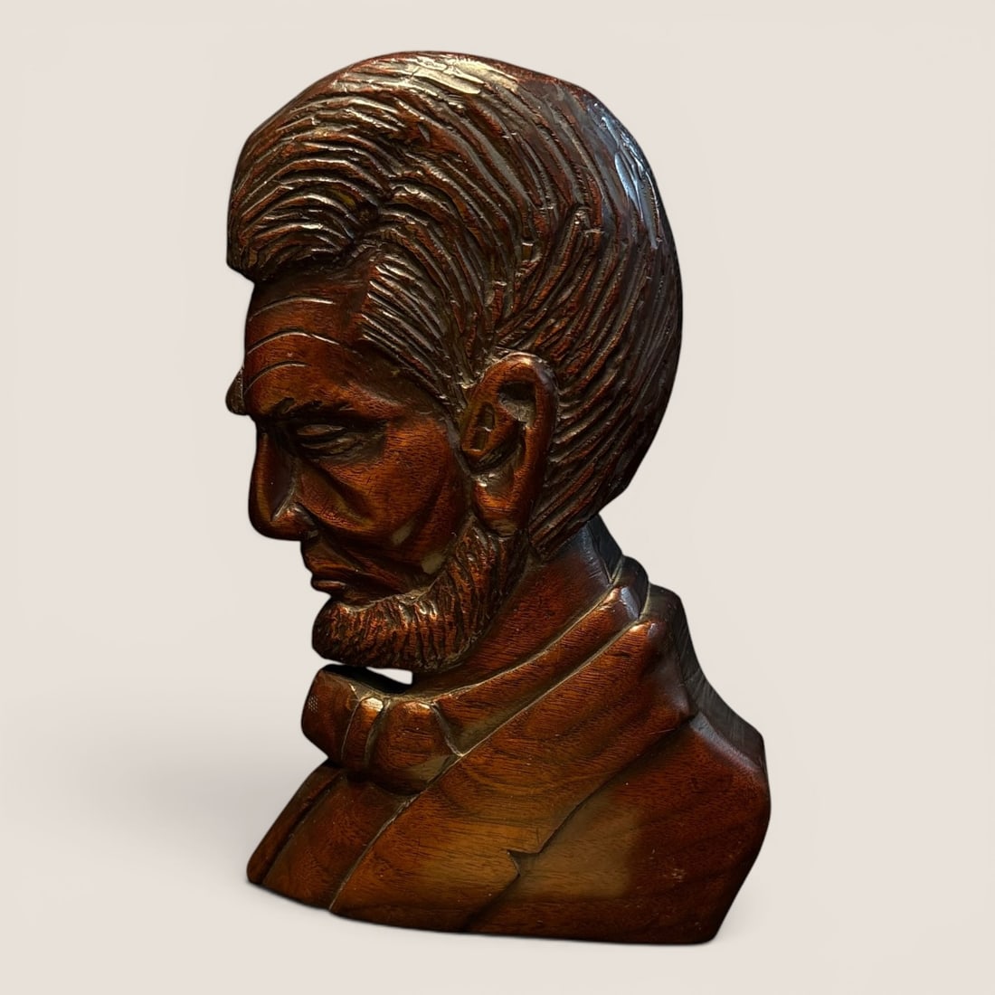 1935-1940 Unique Carved Wood Lincoln Bust By Bob Lutz: Very nicely carved wood Lincoln head, was carved between 1935-1940 by a one armed man by the name of " Bob Lutz ", 10 inches tallWe provide in-house shipping on all items in the auction. Bid directly 