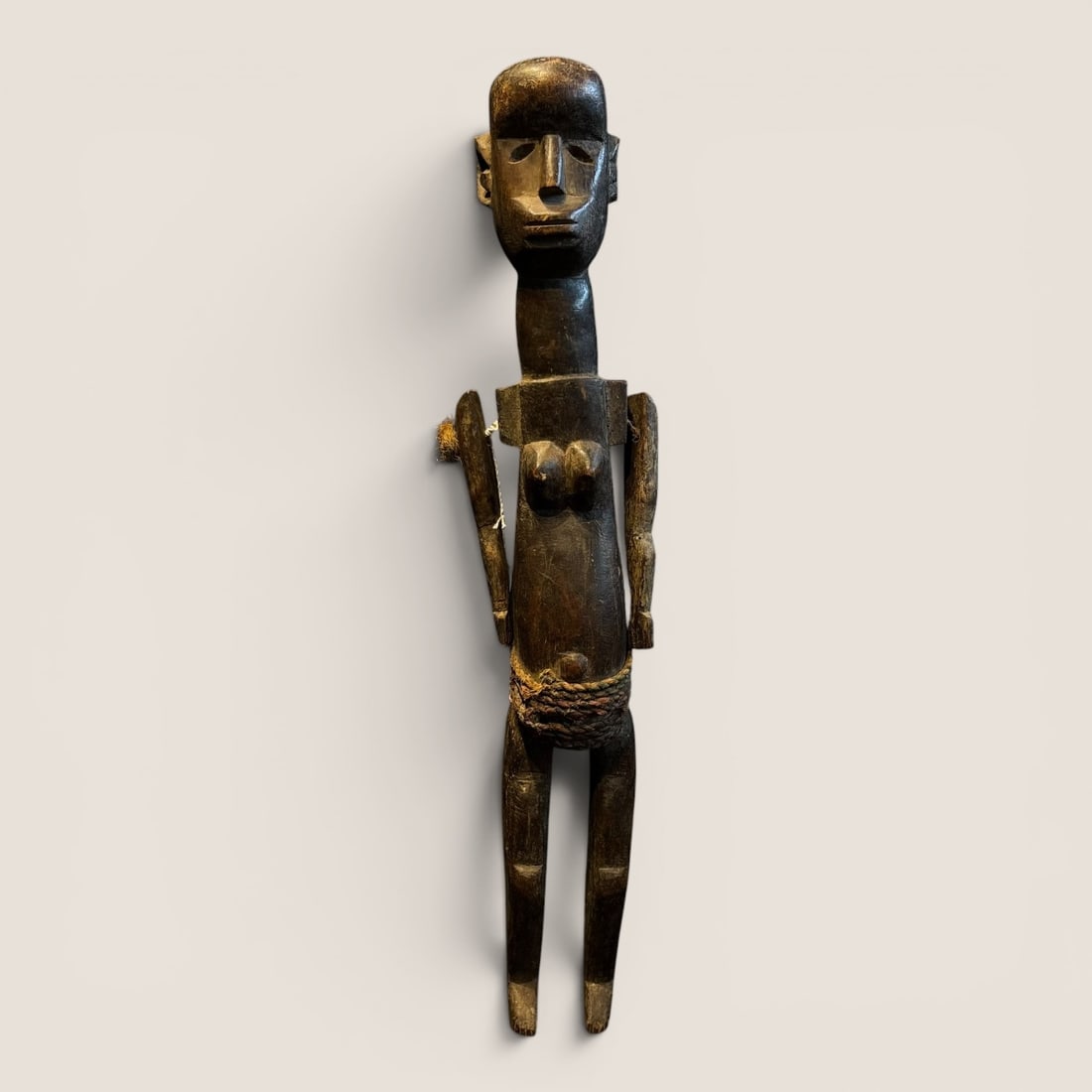 Antique Wood African Doll: A 24 inch african antique wood doll, moveable arms, very nice early patina to the wood, complete and goodWe provide in-house shipping on all items in the auction. Bid directly at Bid.Ziebarths.com for