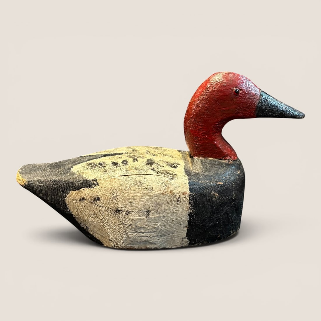 Antique Folk Art Redhead Duck Decoy: Antique wood duck decoy, high neck head, old paint on body, ( head might have been repainted ), glass eyesWe provide in-house shipping on all items in the auction. Bid directly at Bid.Ziebarths.com fo