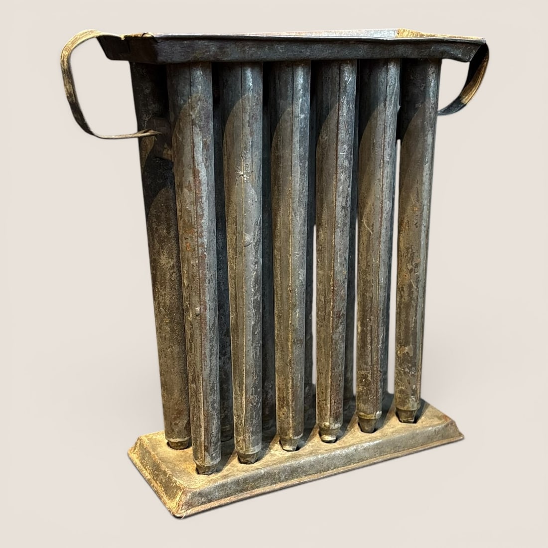 Antique 12 Tube Tin Candle Molds: Good 19th century 12 tube tin candle mold, very good original conditionWe provide in-house shipping on all items in the auction. Bid directly at Bid.Ziebarths.com for a lower buyers premium (18%).