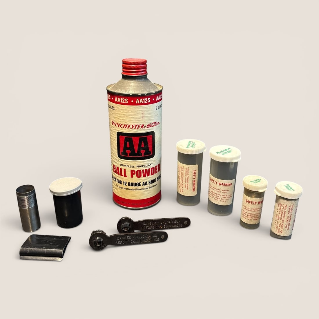 Winchester Powder Can & Various Shotgun Chokes: A Winchester Ball Powder can and various shotgun chokesWe provide in-house shipping on all items in the auction. Bid directly at Bid.Ziebarths.com for a lower buyers premium (18%).