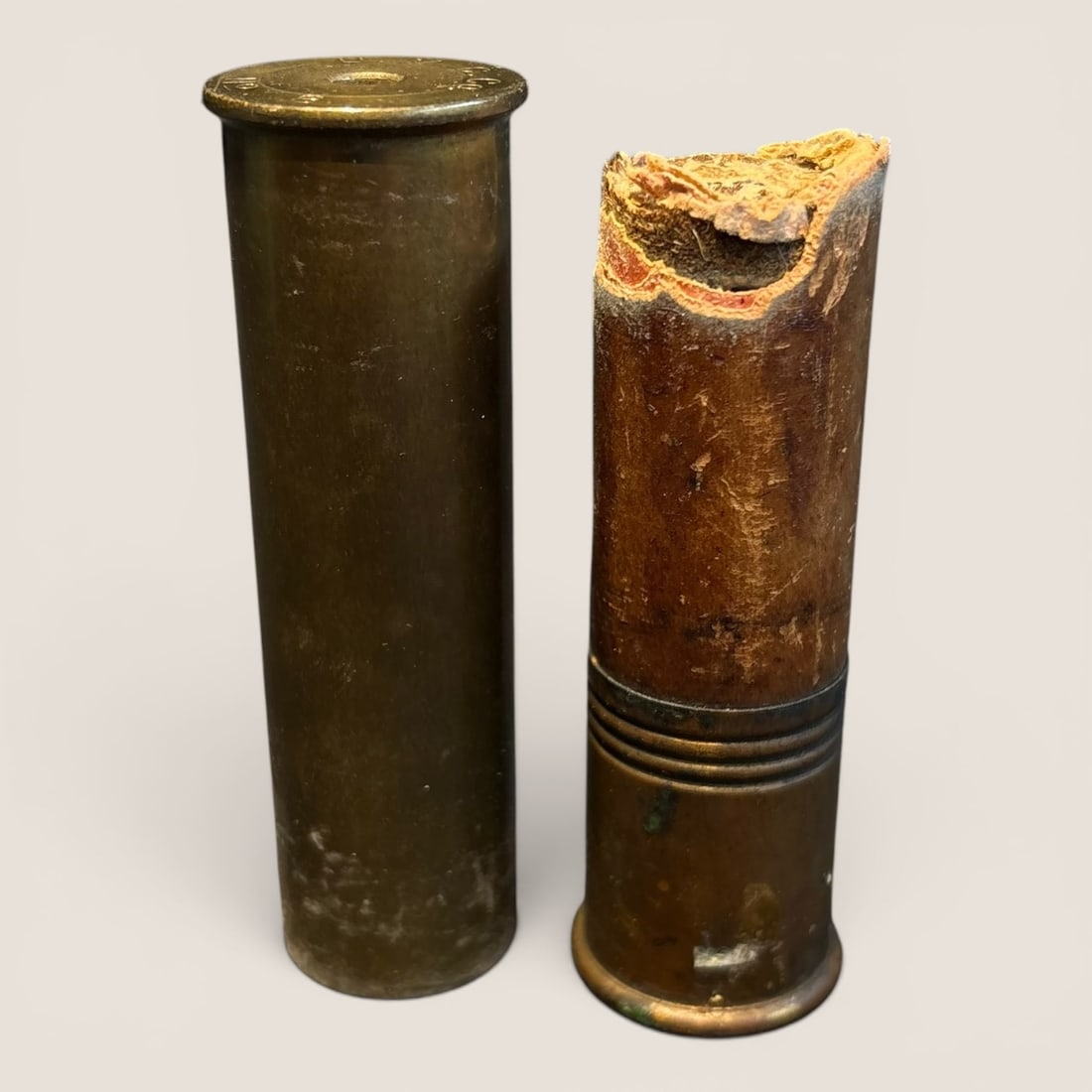 1 Brass & 1 Paper Vintage 8 gauge Shotgun Shell Casings: 1 Brass & 1 paper 8 gauge vintage shotgun shell casingWe provide in-house shipping on all items in the auction. Bid directly at Bid.Ziebarths.com for a lower buyers premium (18%).