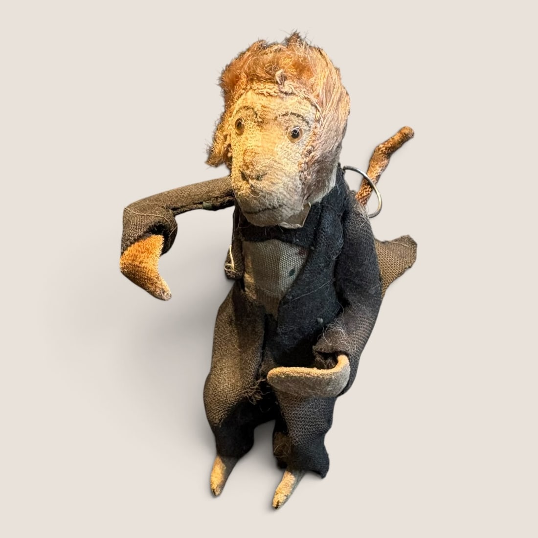 Antique Wind-Up Monkey Toy: This is an early monkey key wind wind-up toy in excellent original and working condition 4 1/2 inches cloth costume arms move and tail spins excellent Bid directly at Bid.Ziebarths.com for a lower buy