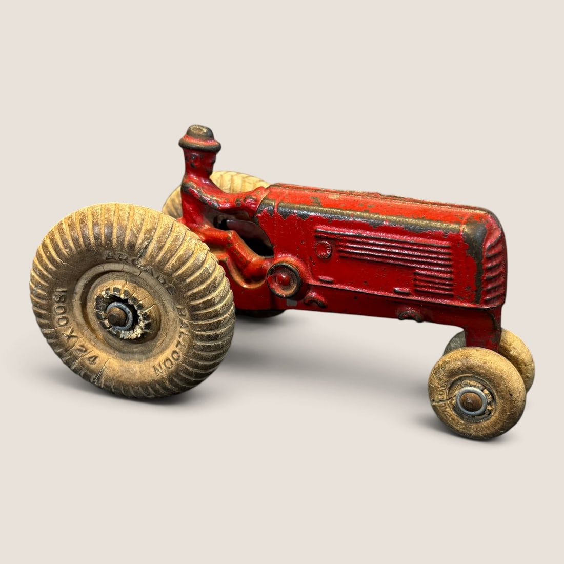Antique Arcade Oliver Model 70 Cast Iron Tractor: Good Arcade Oliver Model 70 cast iron tractor 5 inch complete original condition Bid directly at Bid.Ziebarths.com for a lower buyers premium (18%). We offer in-house shipping on all items.