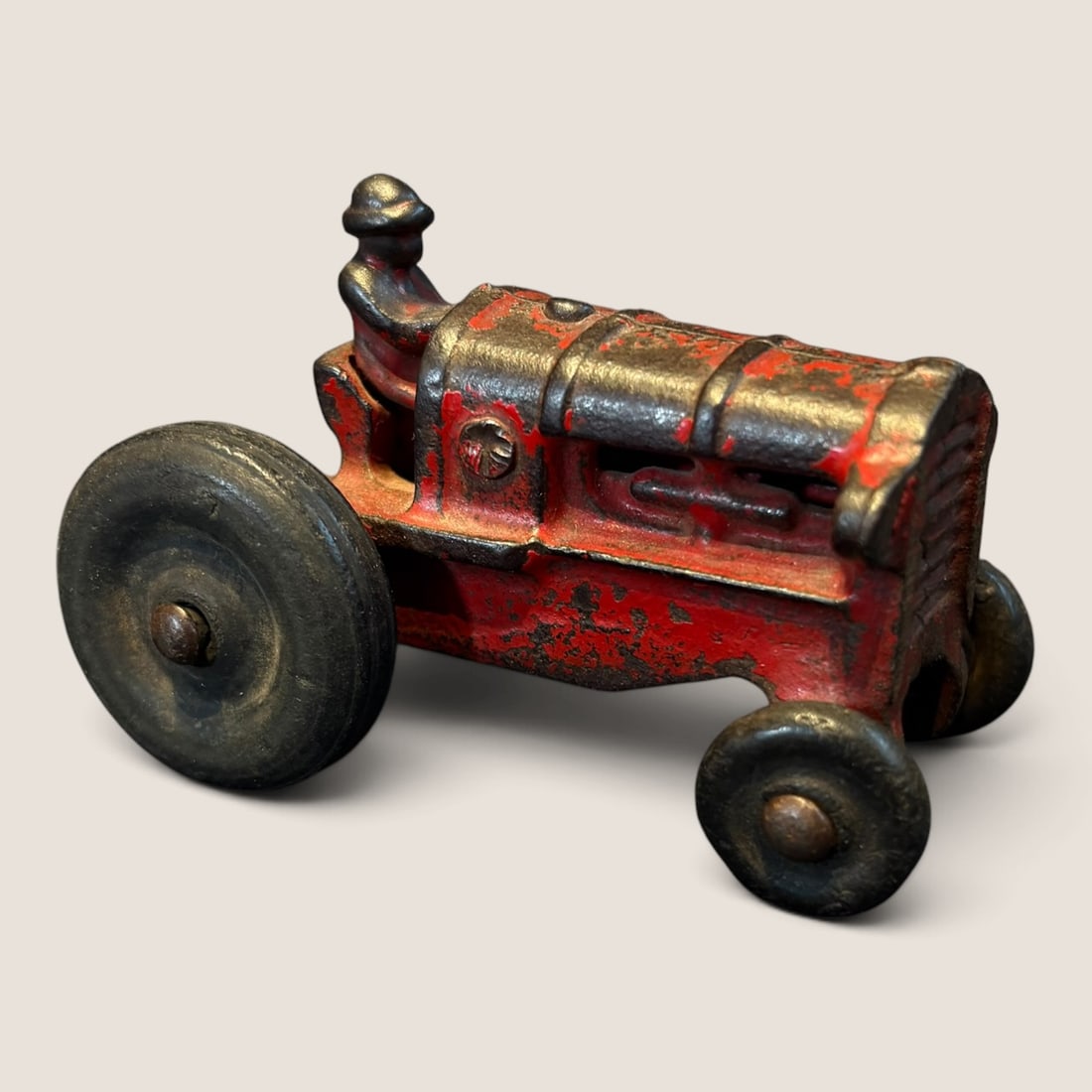 1930s Arcade Cast Iron Allis Chalmers Toy Tractor: A small 3 inch antique Arcade cast iron toy tractor all original and good Bid directly at Bid.Ziebarths.com for a lower buyers premium (18%). We offer in-house shipping on all items.