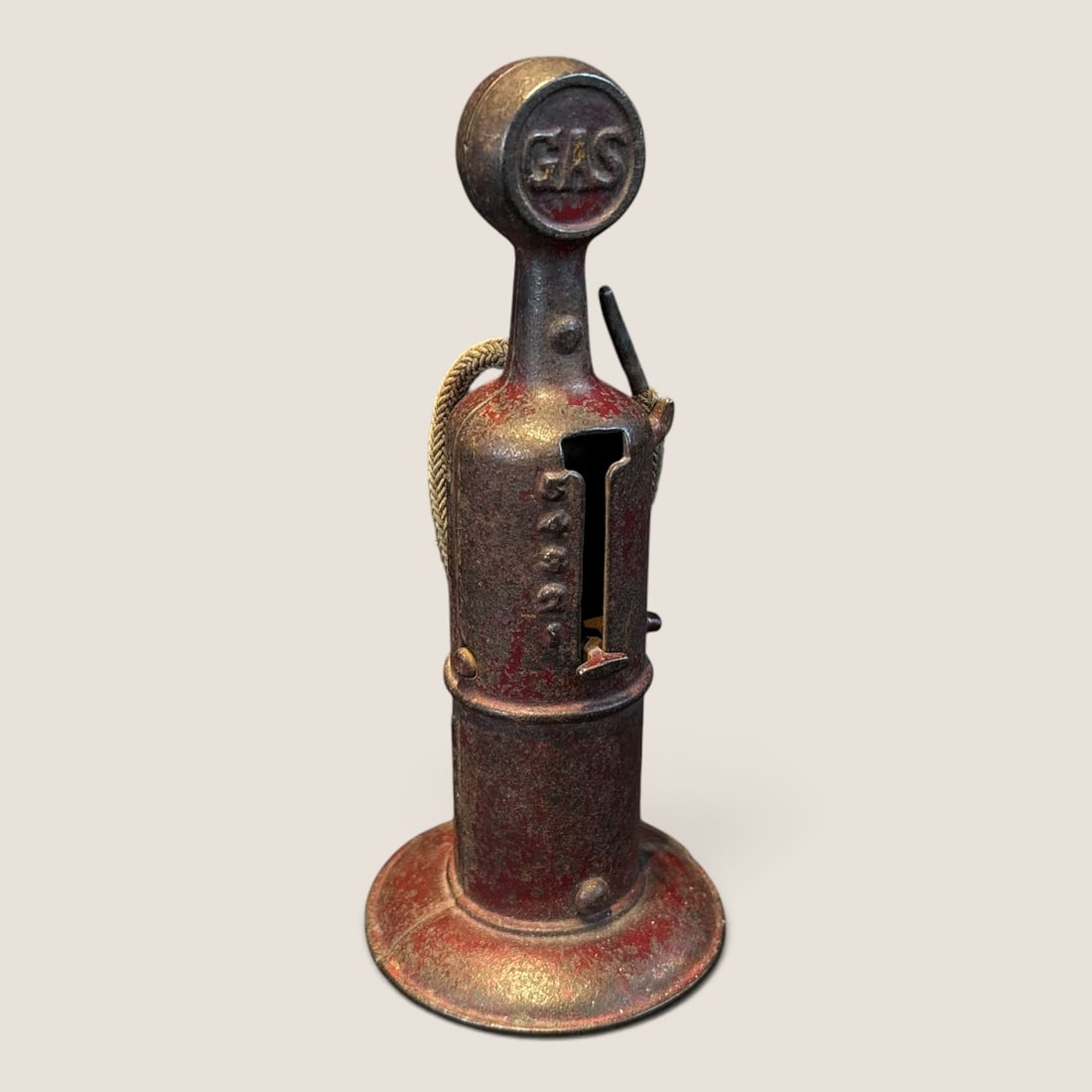 1930s Cast Iron Toy Gas Pump: 1930s cast iron toy gas pump. either Arcade or AC Williams 6 1/2 inch tall complete but crank missing Bid directly at Bid.Ziebarths.com for a lower buyers premium (18%). We offer in-house shipping on 