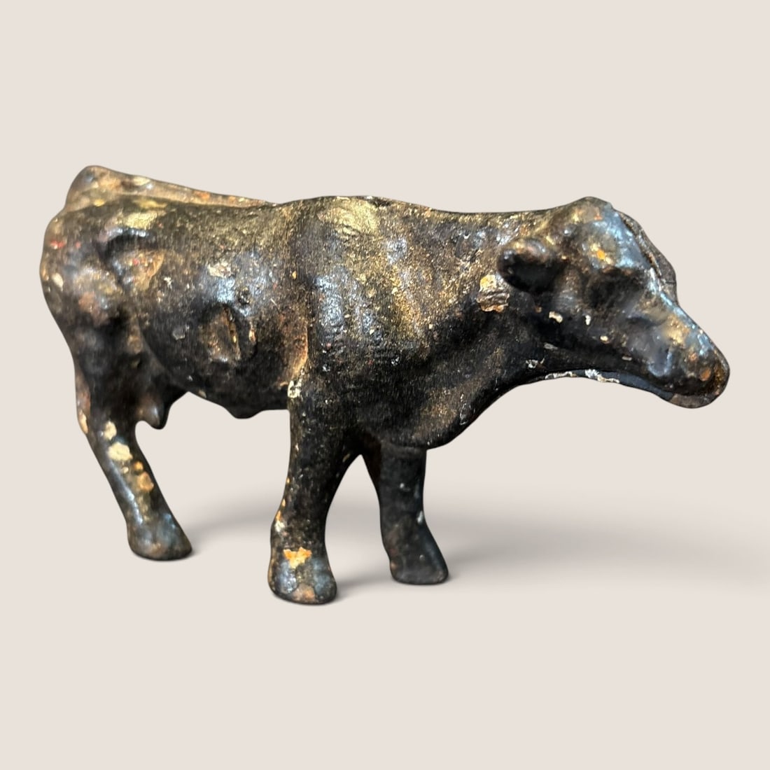 Antique Cast Iron Cow Still Bank: Antique cast iron cow still bank 4 1/2 inch complete Bid directly at Bid.Ziebarths.com for a lower buyers premium (18%). We offer in-house shipping on all items.