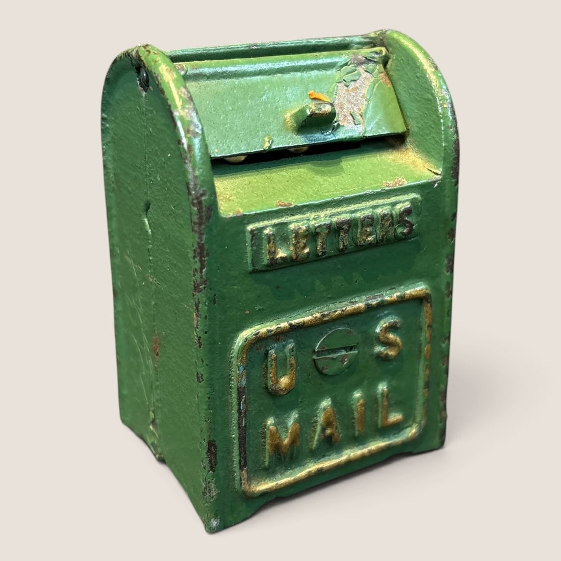 Antique Cast Iron US Mail Penny Bank: Antique US Mail cast iron penny bank all original and complete 2 3/4 tall x 2 wide x 1 1/2 deep Bid directly at Bid.Ziebarths.com for a lower buyers premium (18%). We offer in-house shipping on all it