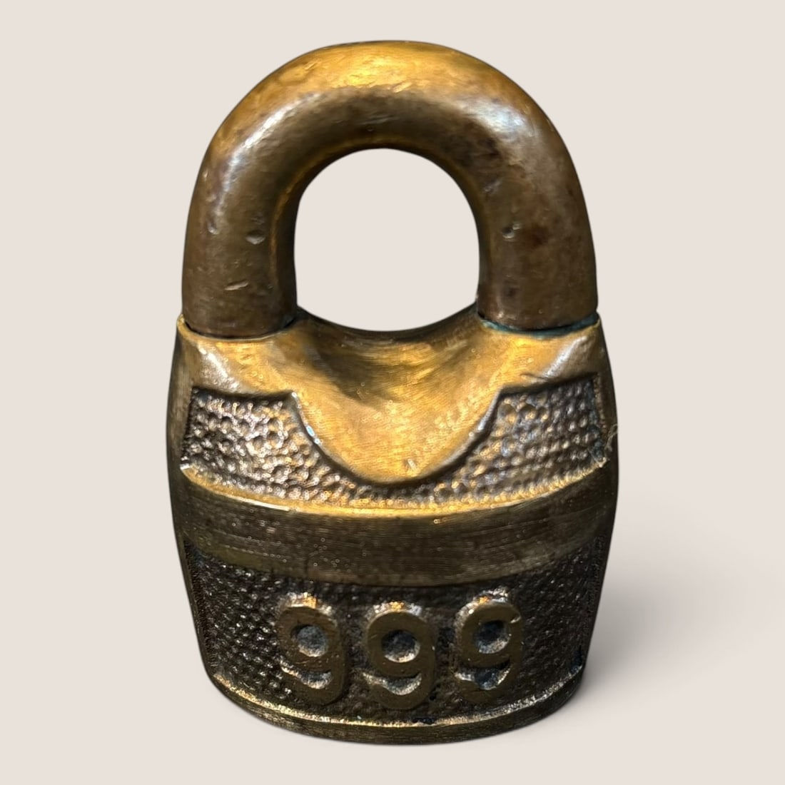 Sm. Brass Vintage Padlock: A small brass vintage padlock 999 embossed on sides no key 2 3/8 tall Bid directly at Bid.Ziebarths.com for a lower buyers premium (18%). We offer in-house shipping on all items.