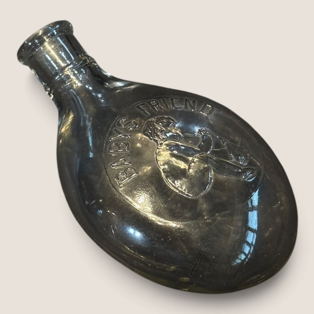 Antique Glass Turtle Nursing Bottle: Antique nursing bottle Baby's Friend and baby embossed on the front of glass excellent Bid directly at Bid.Ziebarths.com for a lower buyers premium (18%). We offer in-house shipping on all items.