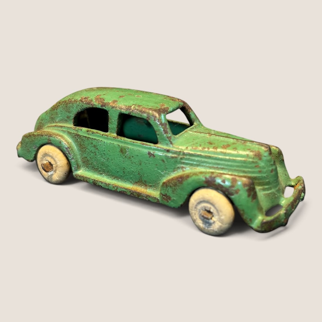 1930s Arcade Or Hubley Cast Iron Sedan: Small vintage Arcade or Hubley cast iron sedan 3 1/2 inch complete and original Bid directly at Bid.Ziebarths.com for a lower buyers premium (18%). We offer in-house shipping on all items.