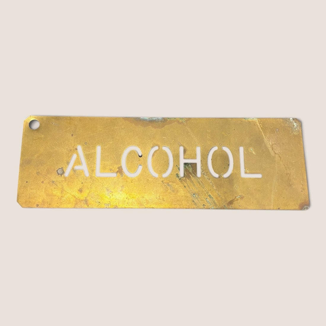 Vintage Brass Alcohol Stencil: Vintage brass alcohol stencil 18 x 6 excellent Bid directly at Bid.Ziebarths.com for a lower buyers premium (18%). We offer in-house shipping on all items.