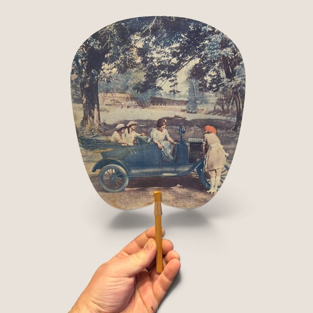 Early 1900s Advertising Fan: An early 1900s advertising fan note car and womens dress ! Bid directly at Bid.Ziebarths.com for a lower buyers premium (18%). We offer in-house shipping on all items.
