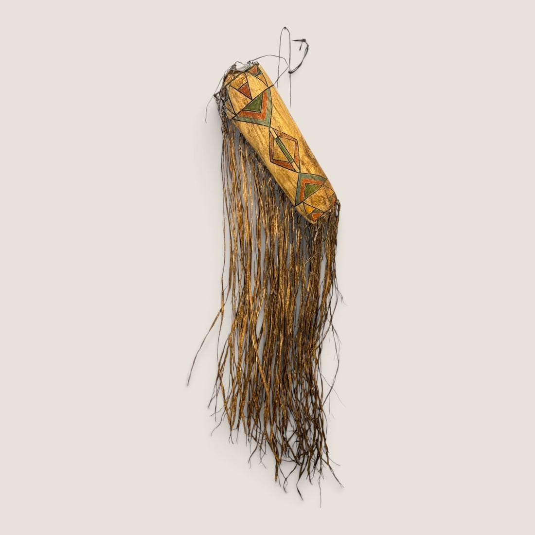 Large Painted Parfleche Container with Extensive Fringe: Circa 1890-1900, the case itself measuring approx 19-20 inches in length with the fringe hanging down over 3 feet. Good overall condition with age expected wear. A fine example of an early Plains