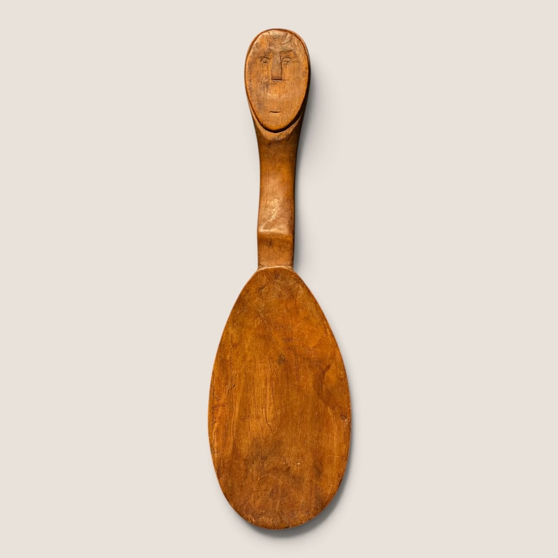 Carved Northwest Coast Paddle Ladle: Superb carving with faces to both the front and back of handle, measuring approx 12.75 x 3.75 inches.We offer effecient & affordable in-house shipping on all items in this auction. Bid directly at