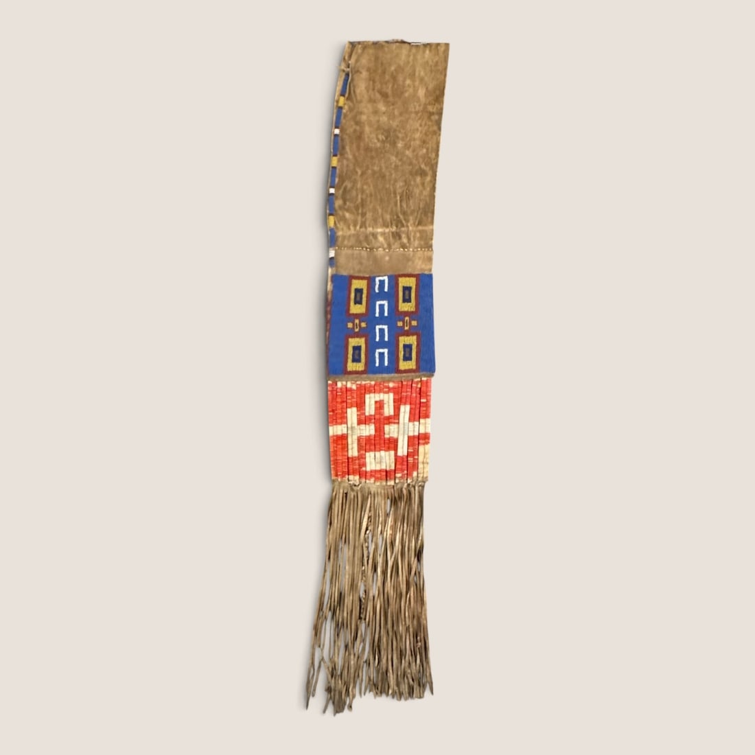 Rare! Petite 19th C Cheyenne Pipe Bag: Excellent condition, and a rare example. Approx 31 inches in length with the fringe measuring 16 inches of that. Measuring approx 4.5 inches wide. Smaller Cheyenne pipe bags of this quality have