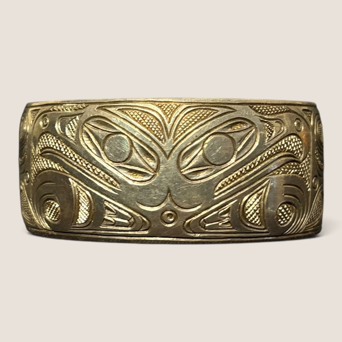Engraved Haida Bracelet: Signed and inscribed "Geo Sinclair 1/1/60"; approximate circumference 6.875 in.We offer effecient & affordable in-house shipping on all items in this auction. Bid directly at Bid.Ziebarths.com for