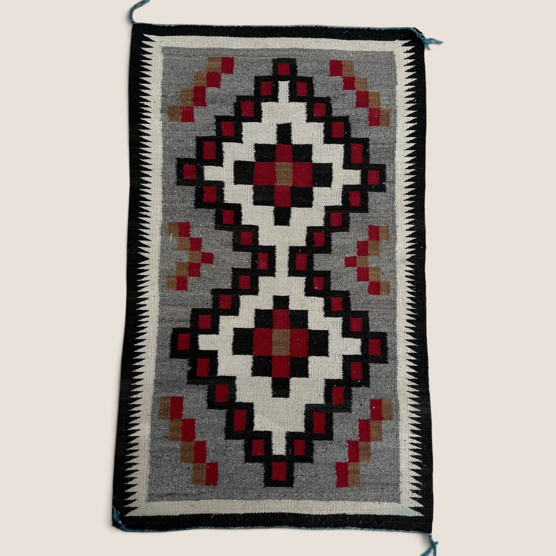 Geometric Navajo Weaving: Approx 50 x 29.5 inches. Good condition.We offer effecient & affordable in-house shipping on all items in this auction. Bid directly at Bid.Ziebarths.com for our lowest buyers premium (18%)!