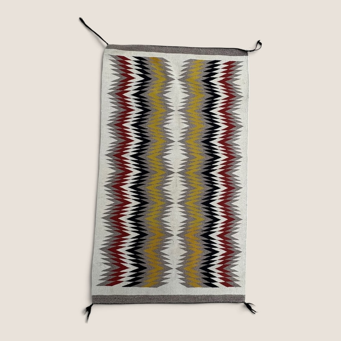 Navajo Eyedazzler Weaving: Approx 48 x 28 inches. Good condition.We offer effecient & affordable in-house shipping on all items in this auction. Bid directly at Bid.Ziebarths.com for our lowest buyers premium (18%)!
