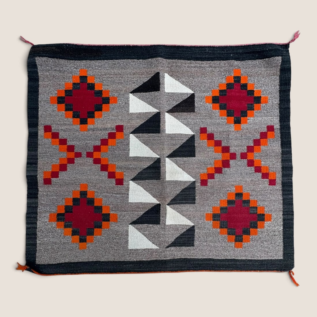 Superb Navajo Single Saddle Blanket, Circa 1910: Measures approx 32 x 27 inches, excellent condition.We offer effecient & affordable in-house shipping on all items in this auction. Bid directly at Bid.Ziebarths.com for our lowest buyers premium