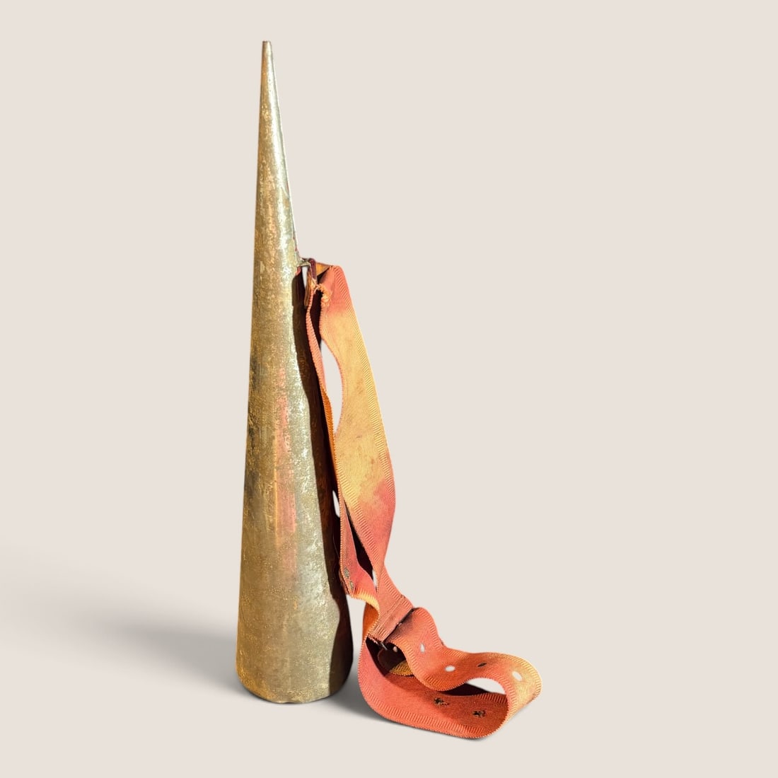Unique Antique Tin Item With Original Strap: Unique tin cone item with original strap, 18 1/2 inches long, don't know what it was used for , in excellent original conditionWe offer effecient & affordable in-house shipping on all items in this