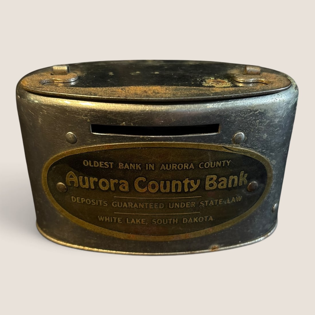 Antique Metal Promotional Coin Bank, " Aurora County Bank ": Vintage " Aurora County Bank " Promotional coin bank, 4 inch, goodWe offer effecient & affordable in-house shipping on all items in this auction. Bid directly at Bid.Ziebarths.com for our lowest buyer