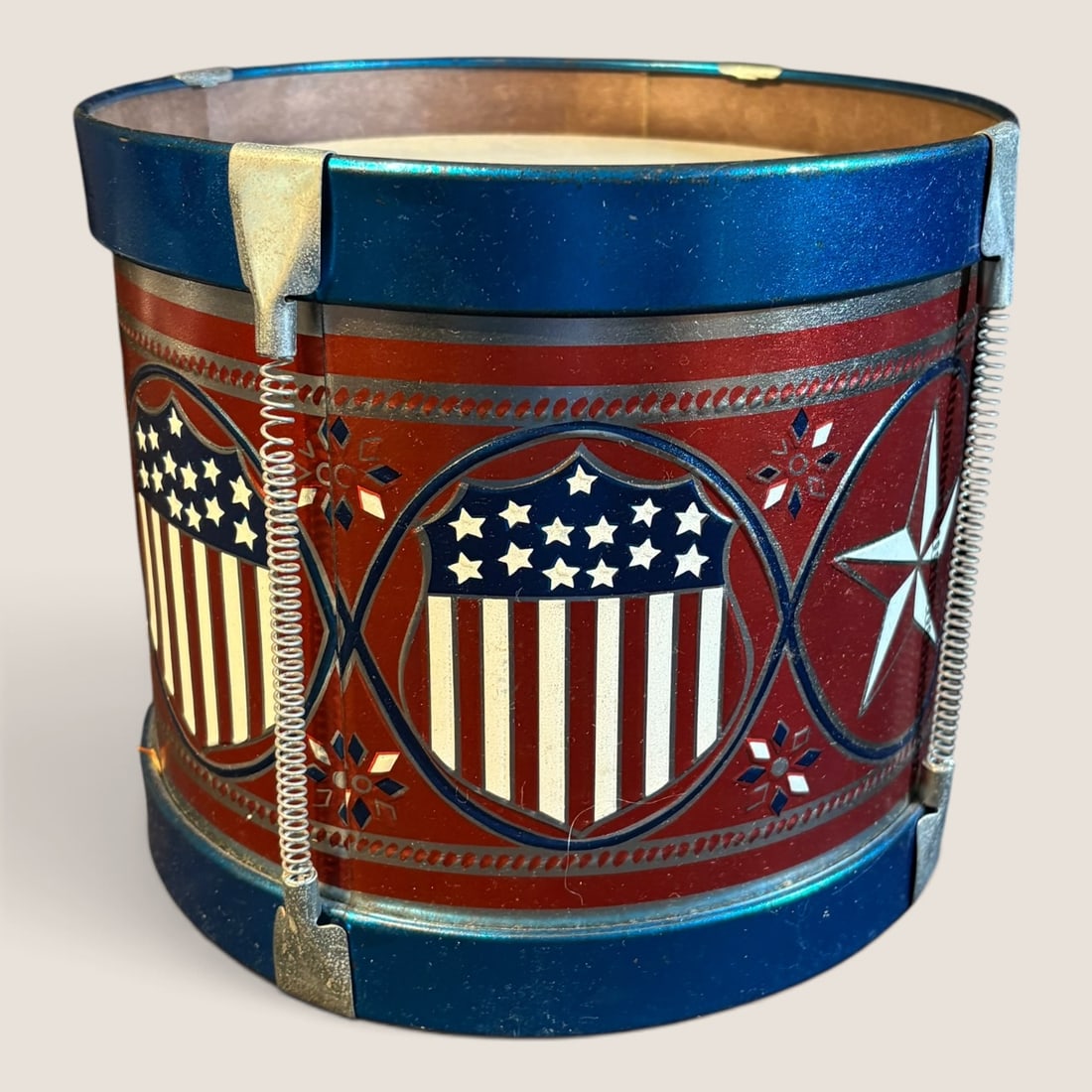 Tin Toy Drum With Patriotic Stars And Stripes: Tin toy drum with patriotic stars and stripes, 8 3/4 round x 7 1/.2 tall, excellentWe offer effecient & affordable in-house shipping on all items in this auction. Bid directly at Bid.Ziebarths.com for
