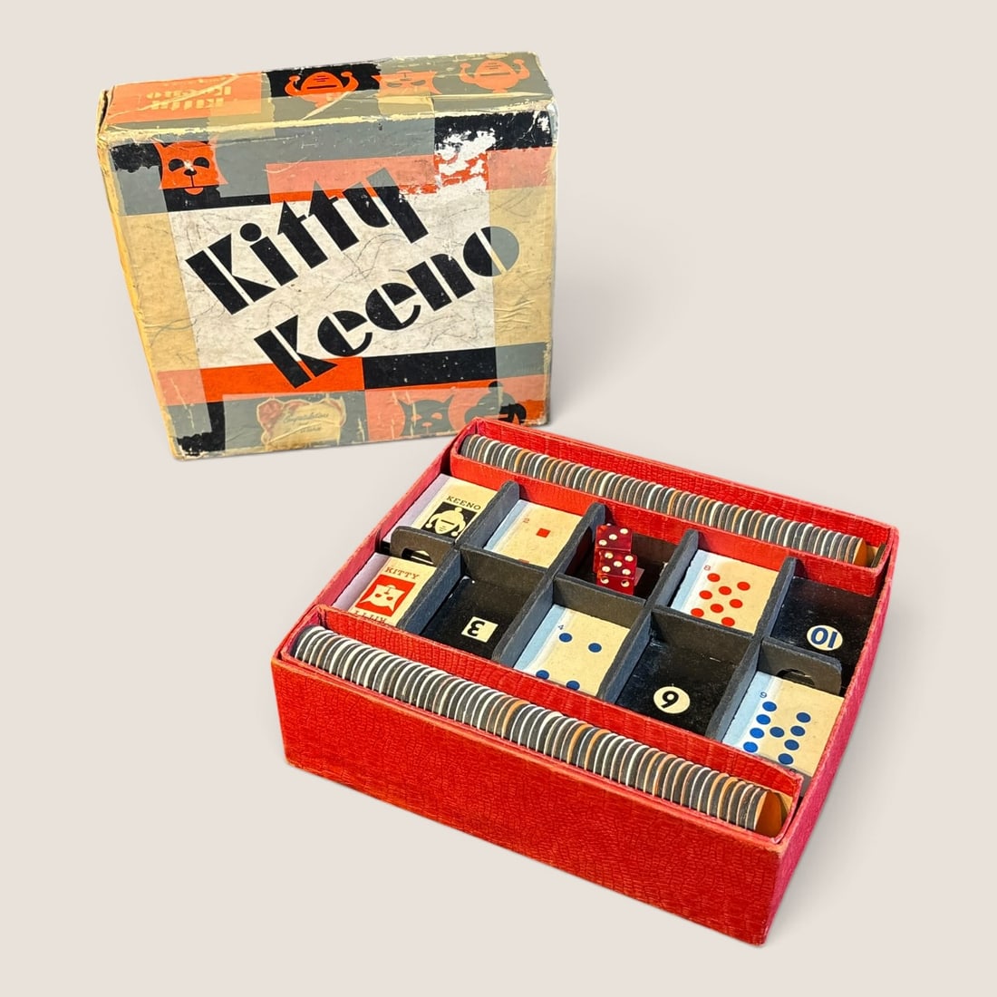 Vintage " Kitty Keeno " Game In Original Box: A vintage " Kitty Keno " game in original box, Box has been tapped up someWe offer effecient & affordable in-house shipping on all items in this auction. Bid directly at Bid.Ziebarths.com for our lowe