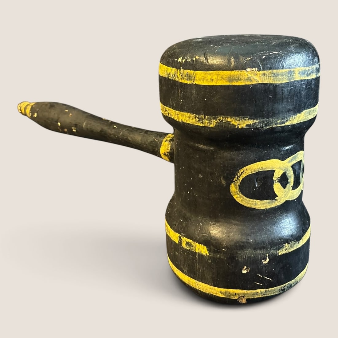 Independent Order of Odd Fellows Fraternal Polychrome Painted Wooden Mallet: A hand-turned ceremonial wooden mallet created for use by the Independent Order of Odd Fellows (IOOF). The object features a stout, cylindrical head with a recessed central waist and a long, tapering 
