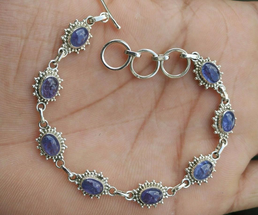 Natural Tanzanite 92.5 Sterling Silver Bracelet: Beautiful Natural Tanzanite Gemstone Handmade 92.5 Sterling Silver Bracelet Jewelry , Gemstone : Tanzanite , Bracelet Size : 8 Inches (With adjustable links) , Metal Purity : 92.5 Sterling Silver , Br