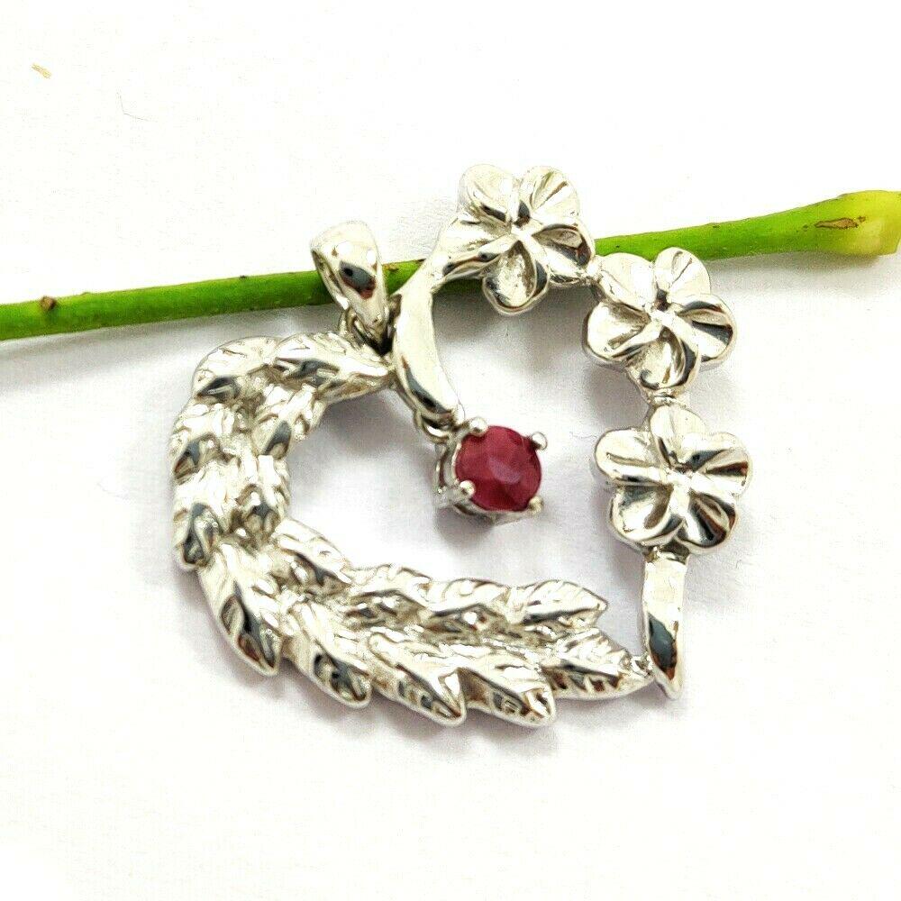 RED RUBY GEMSTONE 92.5 STERLING SILVER HEART HANDMADE: RED RUBY GEMSTONE 92.5 STERLING SILVER HEART HANDMADE PENDANT , GEMSTONE - RUBY , STONE SHAPE - ROUND , STONE SIZE - 4x4 mm , STONE WEIGHT - 0.50 CTS , METAL - STERLING SILVER , METAL PURITY - 92.5 , 