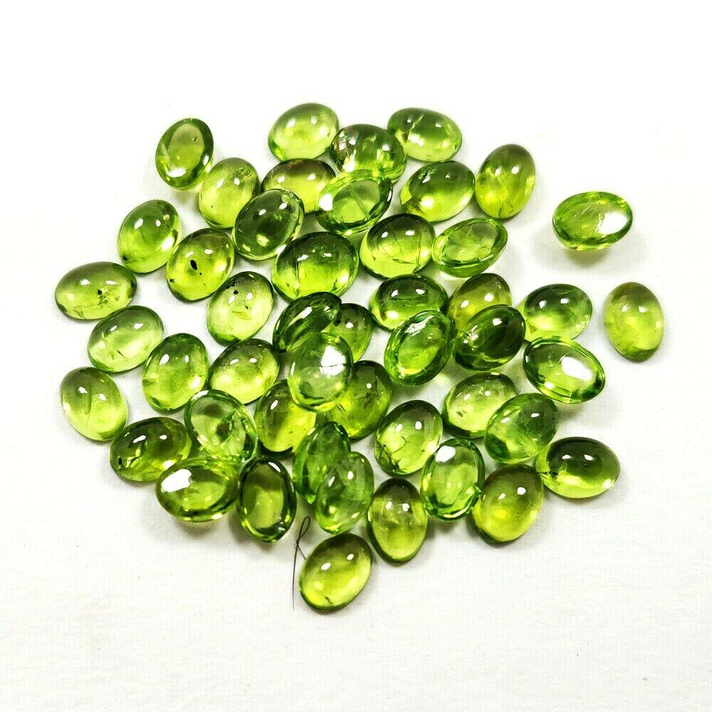 Natural Peridot 7x5 MM Oval Cabochon 25 Pieces: Natural Peridot 7x5 MM Oval Cabochon 25 Pieces Gemstone : Peridot Shape : Oval Size : 7x5 MM Type : Cabochon Color : Green Quantity : 25 Pieces Weight : 28 Carats Country of Origin : Myanmar Country o