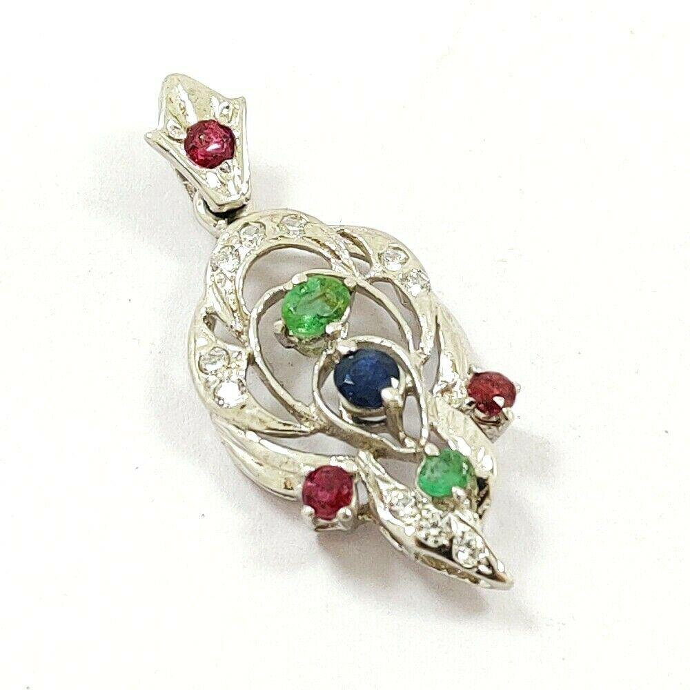 EMERALD/RUBY/SAPPHIRE 925 STERLING SILVER PENDANT: EMERALD/RUBY/SAPPHIRE 925 STERLING SILVER PENDANT Product Type : PENDANT Main Stone : EMERALD/RUBY/SAPPHIRE Main Stone Color : MULTICOLOR Metal : STERLING SILVER Metal Purity : 925 Pendant Size : 1.5"