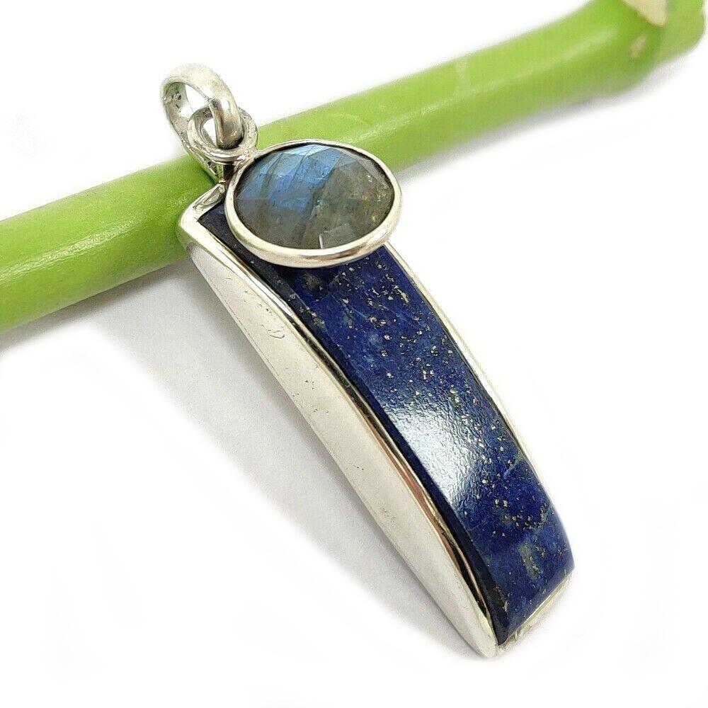 LAPIS LAZULI & LABRADORITE 925 STERLING SILVER PENDANT: LAPIS LAZULI & LABRADORITE 925 STERLING SILVER PENDANT Product Type : PENDANT Main Stone : LAPIS LAZULI/LABRADORITE Main Stone Shape : FANCY Main Stone Size : 10X40 Main Stone Color : Metal : STERLING