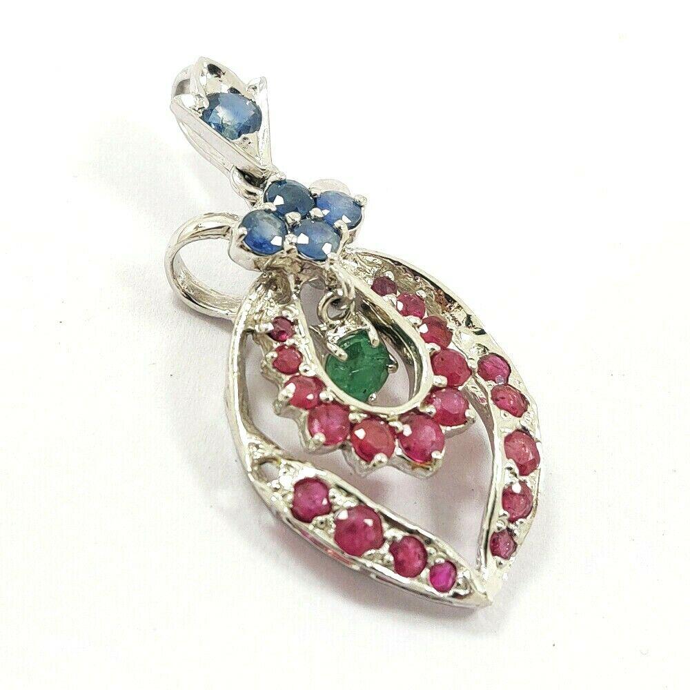EMERALD/RUBY/SAPPHIRE 925 STERLING SILVER PENDANT: EMERALD/RUBY/SAPPHIRE 925 STERLING SILVER PENDANT Product Type : PENDANT Main Stone : EMERALD/RUBY/SAPPHIRE Main Stone Color : MULTICOLOR Metal : STERLING SILVER Metal Purity : 925 Pendant Size : 1.7"