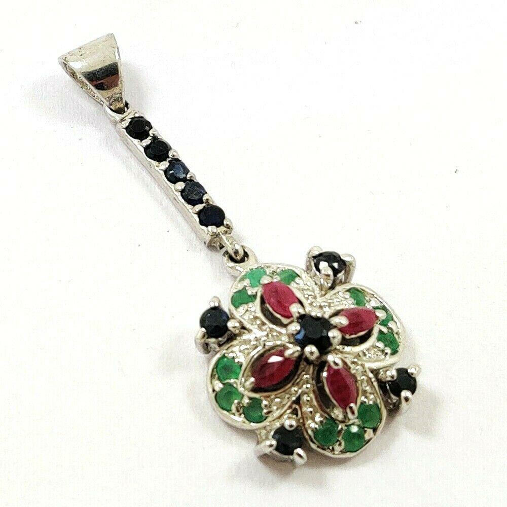 EMERALD/RUBY/SAPPHIRE 925 STERLING SILVER PENDANT: EMERALD/RUBY/SAPPHIRE 925 STERLING SILVER PENDANT Product Type : PENDANT Main Stone : EMERALD/RUBY/SAPPHIRE Main Stone Color : MULTICOLOR Metal : STERLING SILVER Metal Purity : 925 Pendant Size : 1.7"