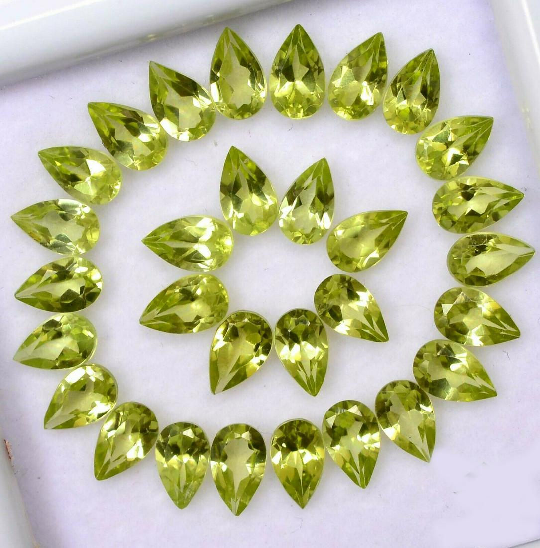 Natural Peridot 6x4 MM Pear Faceted Cut 100 Pieces: Natural Peridot 6x4 MM Pear Faceted Cut 100 Pieces Gemstone : Peridot Shape : Pear Size : 6x4 MM Type : Faceted Cut Color : Green Quantity : 100 Pieces Weight : 40 Carats Country of Origin : Myanmar C