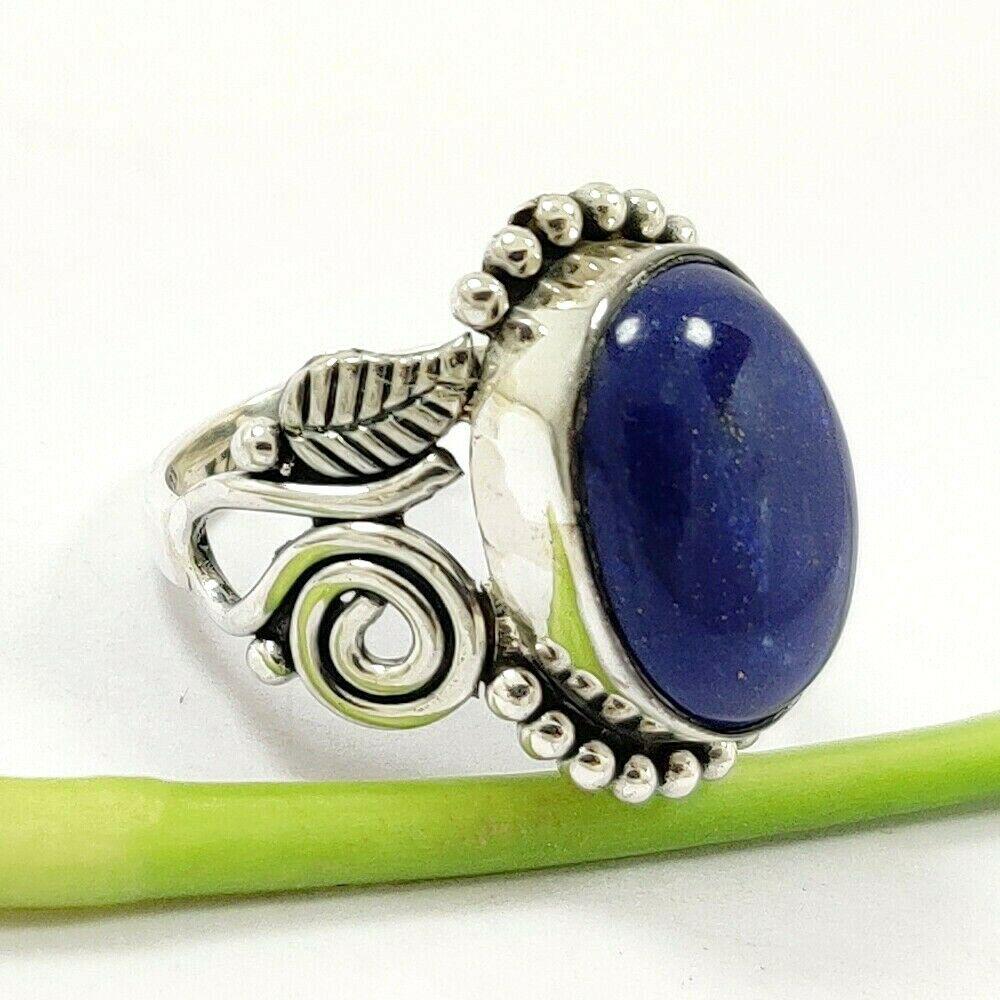 LAPIS LAZULI 92.5 STERLING SILVER RING: LAPIS LAZULI 92.5 STERLING SILVER RING Product Type : RING Main Stone : LAPIS LAZULI Main Stone Shape : OVAL Main Stone Size : 12X15 MM Main Stone Color : BLUE Metal : STERLING SILVER Metal Purity : 9