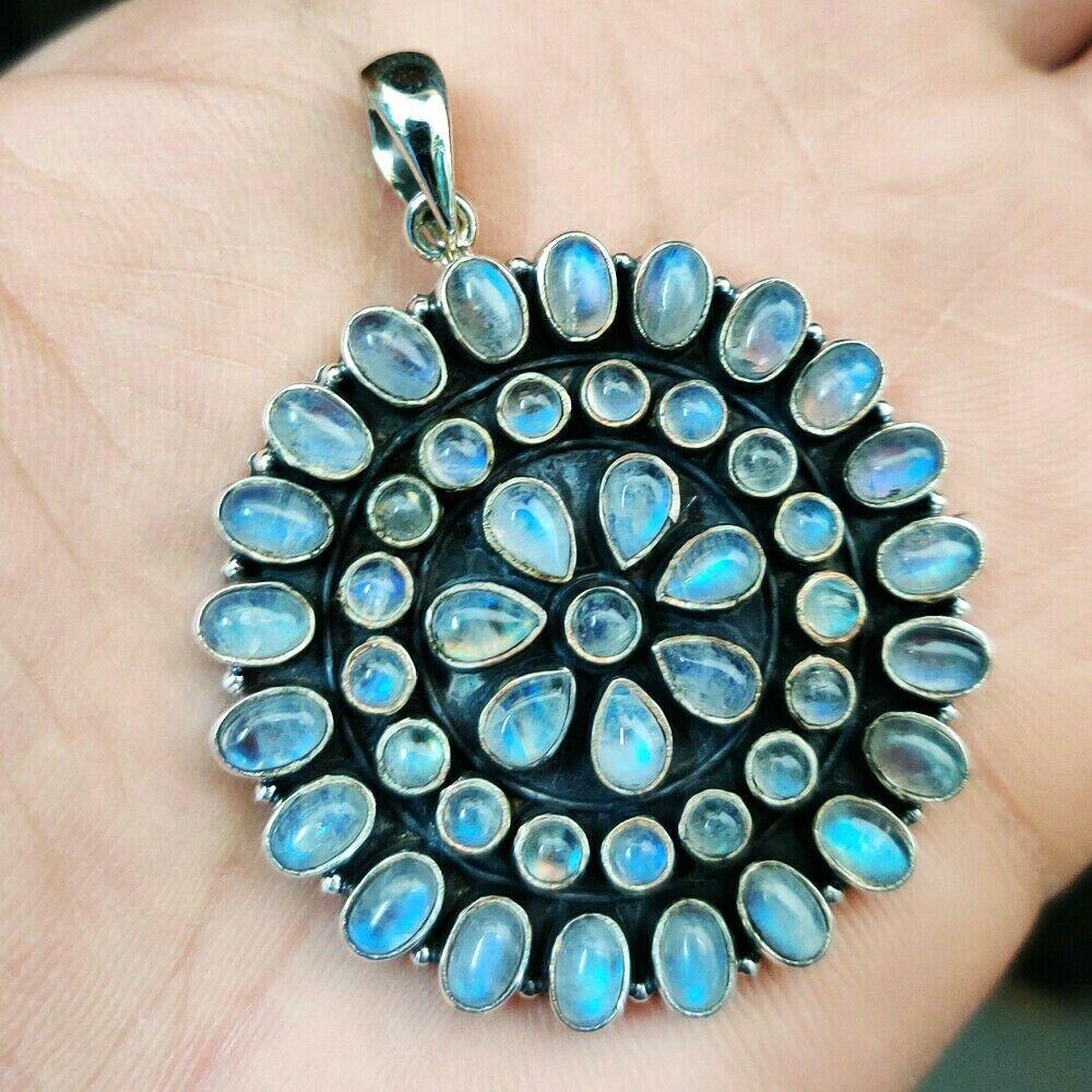 RAINBOW MOONSTONE 92.5 STERLING SILVER PENDANT: RAINBOW MOONSTONE 92.5 STERLING SILVER PENDANT Product Type : PENDANT Main Stone : RAINBOW MOONSTONE Main Stone Color : RAINBOW Main Stone Shape & Size : Oval 6x4 MM 20 Pieces, Pear 6x4 MM 7 Pieces, R