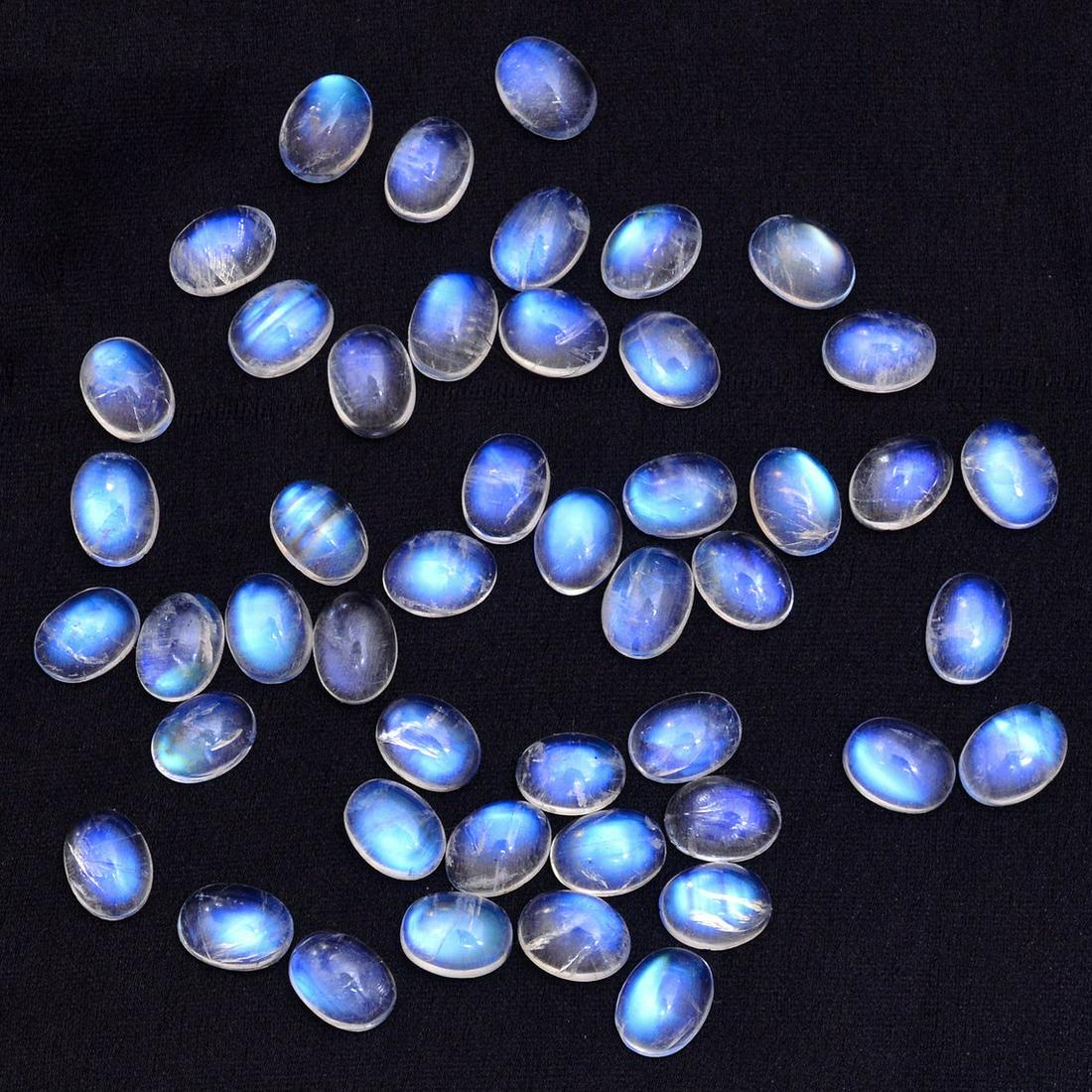 Natural Rainbow Moonstone 6x4 MM Oval Cabochon 100: Natural Rainbow Moonstone 6x4 MM Oval Cabochon 100 Pieces Gemstone : Rainbow Moonstone Shape : Oval Size : 6x4 MM Type : Cabochon Color : Rainbow Quantity : 100 Pieces Weight : 58 Carats Country of Or