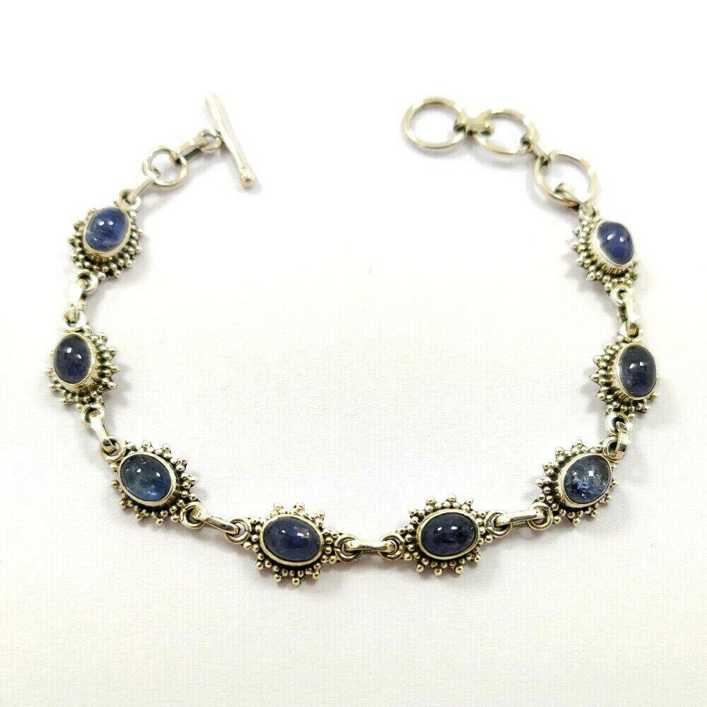 NATURAL TANZANITE 92.5 STERLING SILVER BRACELET: Beautiful Natural Tanzanite Gemstone Handmade 92.5 Sterling Silver Bracelet Jewelry , Gemstone : Tanzanite , Stone Shape : Round , Stone Size : 6x8 MM , Bracelet Size : 8 Inches (With adjustable links