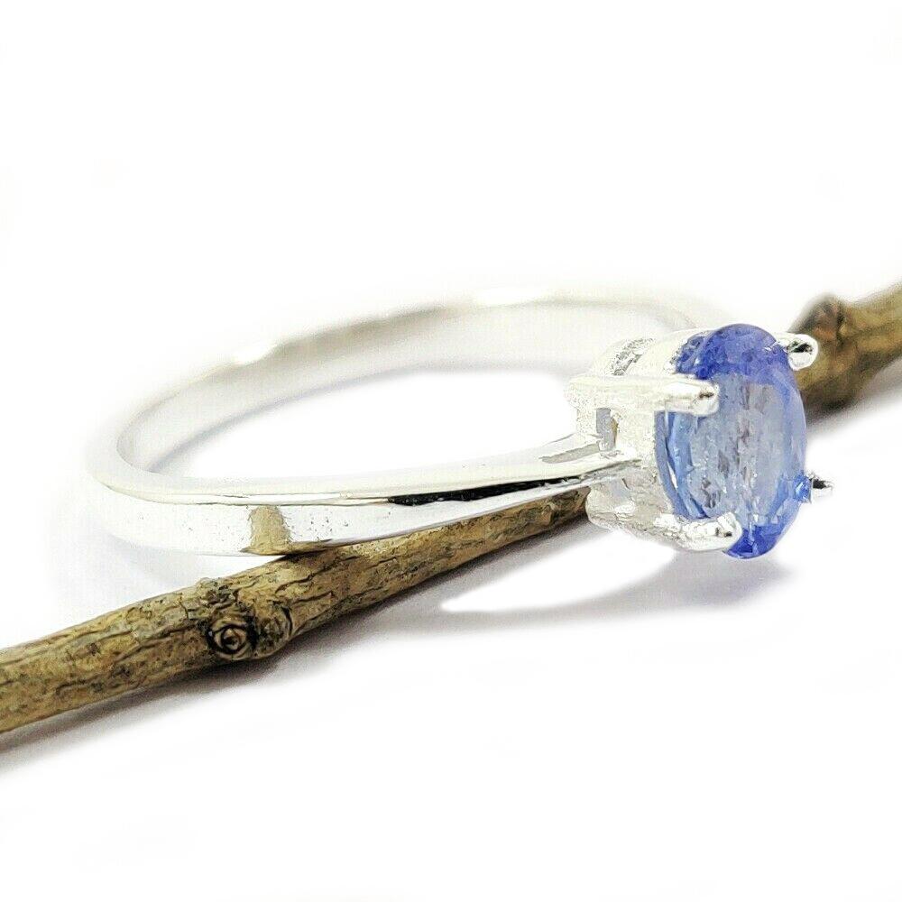 TANZANITE GEMSTONE STERLING SILVER RING: NATURAL TANZANITE GEMSTONE 925 STERLING SILVER HANDMADE RING JEWELRY GEMSTONE : TANZANITE STONE SHAPE : OVAL STONE SIZE : 7X5 MM METAL : STERLING SILVER METAL PURITY : 925 RING SIZE : AVAILABLE SIZES 