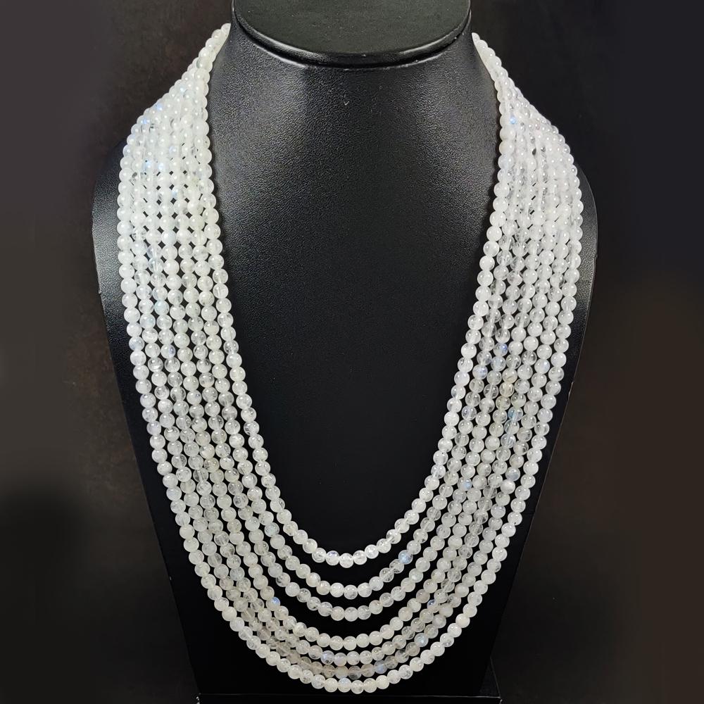 BLUE FLASHY FIRE RAINBOW MOONSTONE NECKLACE: PRODUCT DESCRIPTION - NATURAL BLUE FLASHY FIRE RAINBOW MOONSTONE GEMSTONE 5 MM PLAIN ROUND BEADS NECKLACE 7 STRAND Product Type : Beads Necklace Gemstone : Rainbow Moonstone Color : Rainbow Beads Shap