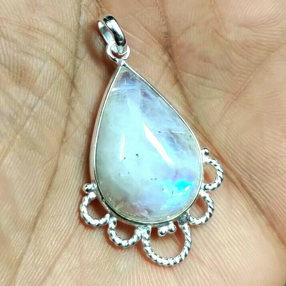 RAINBOW MOONSTONE 92.5 STERLING SILVER PENDANT: RAINBOW MOONSTONE 92.5 STERLING SILVER PENDANT Product Type : PENDANT Main Stone : RAINBOW MOONSTONE Main Stone Color : MULTICOLOR Metal : STERLING SILVER Metal Purity : 92.5 Pendant Size : 1.8" Inche