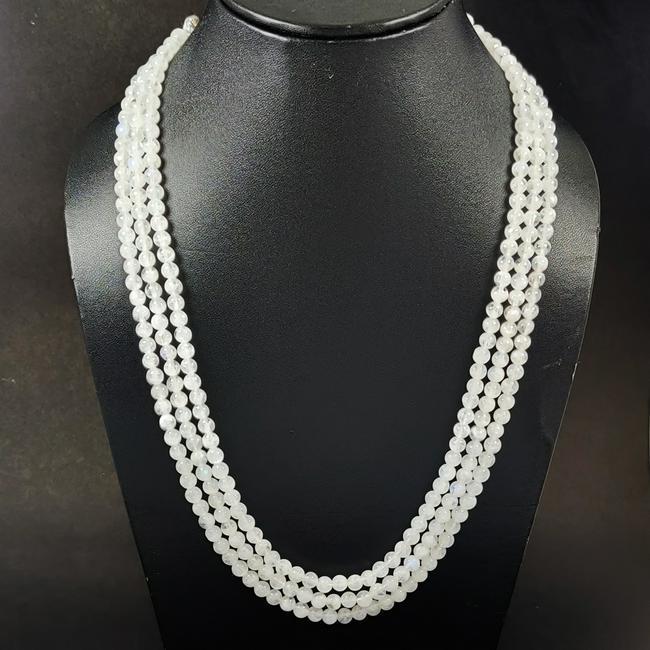 BLUE FLASHY FIRE RAINBOW MOONSTONE NECKLACE: PRODUCT DESCRIPTION : NATURAL BLUE FLASHY FIRE RAINBOW MOONSTONE GEMSTONE 6 MM PLAIN ROUND BEADS NECKLACE 3 STRAND Product Type : Beads Necklace Gemstone : Rainbow Moonstone Color : Rainbow Beads Shap