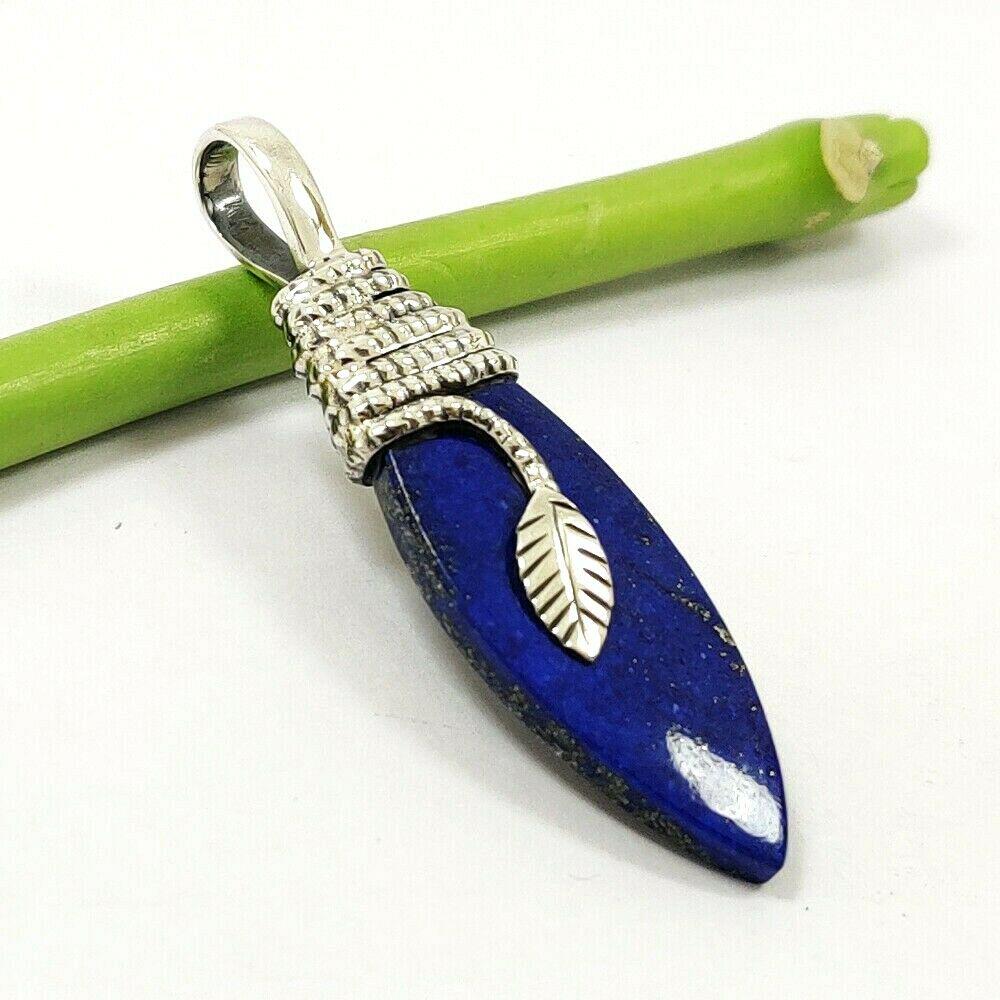LAPIS LAZULI GEMSTONE 925 STERLING SILVER PENDANT: LAPIS LAZULI GEMSTONE 925 STERLING SILVER PENDANT Product Type : PENDANT Main Stone : LAPIS LAZULI Main Stone Shape : FANCY Main Stone Color : BLUE Metal : STERLING SILVER Metal Purity : 925 Pendant S