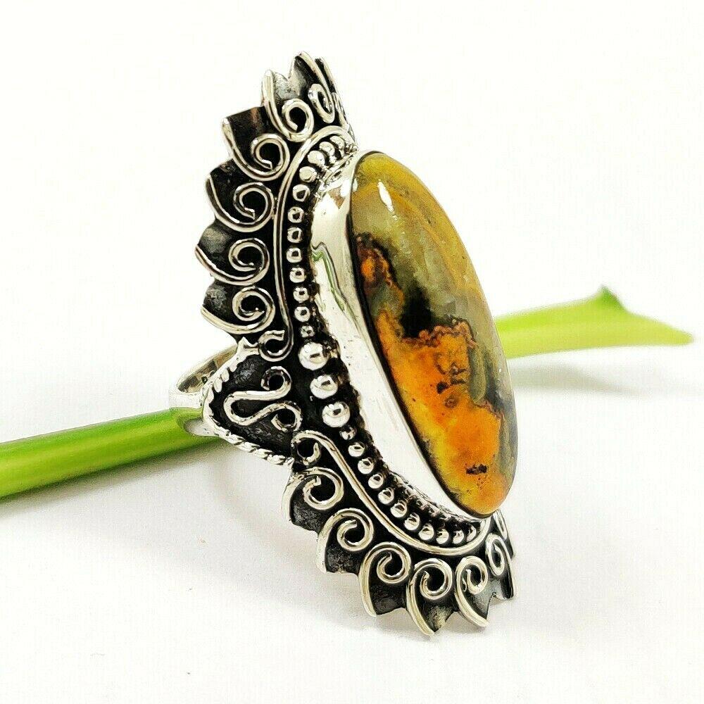 BUMBLE BEE JASPEFR 92.5 STERLING SILVER RING: BUMBLE BEE JASPEFR 92.5 STERLING SILVER RING Product Type : RING Main Stone : JASPER Main Stone Shape : OVAL Main Stone Size : 10X25 MM Main Stone Color : MULTICOLOR Metal : STERLING SILVER Metal Puri